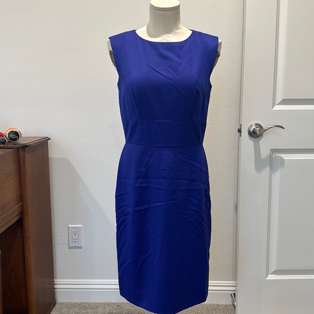 Tahari blue dress. Capped sleeves. Lined. Size 4